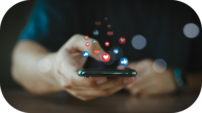 Emojis rising from a phone