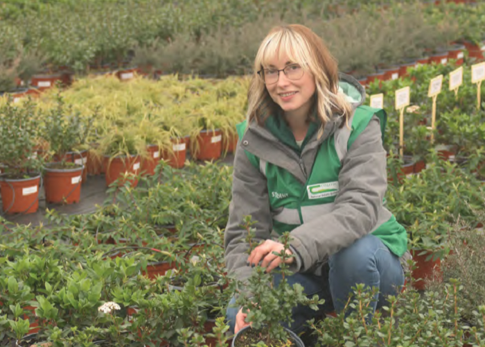 Aisling O Connell pictured surrounded by plants at Tullys Nursery