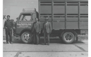 Photo of Italian brothers, Alessandro and Paolo Vigna in front of a cattle truck