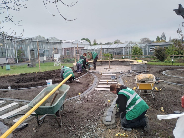 Bots students constructing a garden