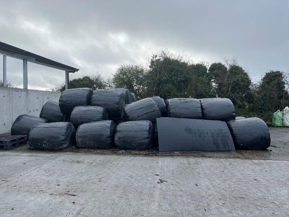 Silage bales stacked in yard