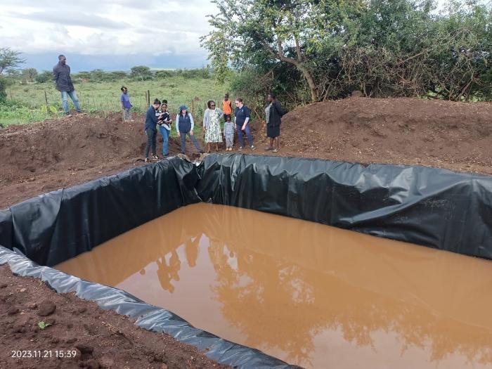 Development Pamoja support the local female farmers with low interest loans to facilitate the construction of water reservoirs for farm use