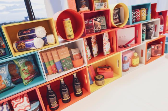 Colourful shelves displaying food products from the Food Works programme