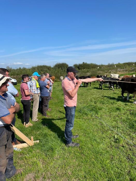 Ger discussing his cow and calf performance at a recent farm walk