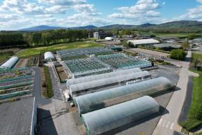 View from the sky of the horticultural unit - greenhouses and tunnels.