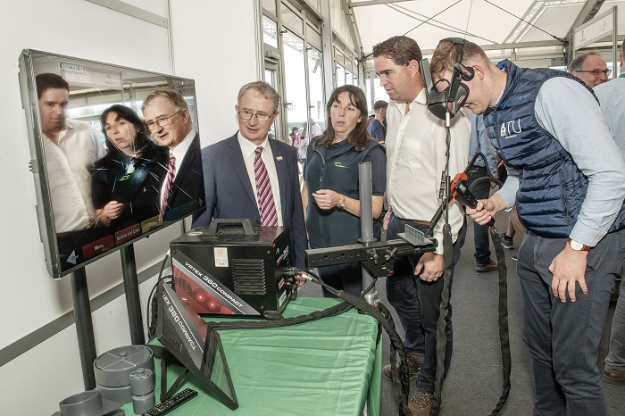 At the National Ploughing Championships in Ratheniska, Co Laois earlier today, Martin Heydon T.D., Minister of State at the Department of Agriculture, Food and the Marine with special responsibility for Farm Safety announced that 13 welding simulators will be funded for use by students completing agricultural training courses. Pictured on the Teagasc stand are Minister Heydon with Professor Frank