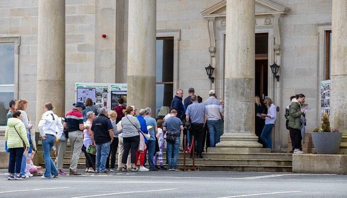 Oak Park 60th attendees queueing at oak park house