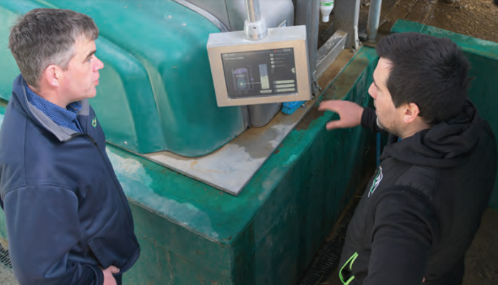 Patrick Gowing and Cathal Fleming pictured at the milking robot
