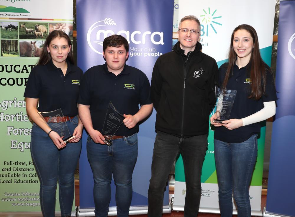 Sarah Doherty,  Sean Gallagher and Faye Corrigan from Kildalton College were winners of the Farm Business and Technology Award. Niall Byrne of NBI makes the presentation