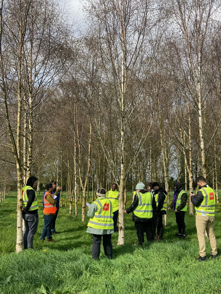 TUD students visiting forestry research plots in Oak Park