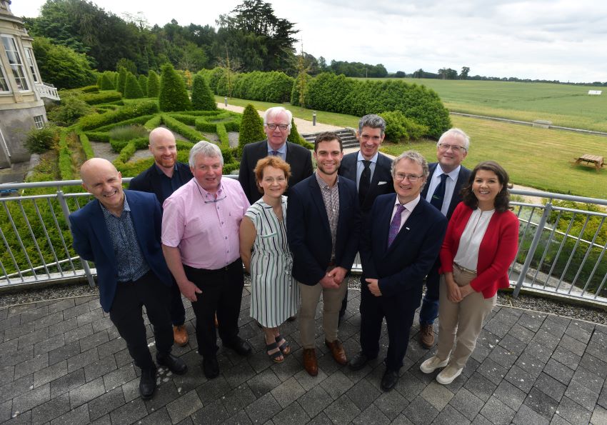 Group of people standing outside at Oak Park, Teagasc Head Office smiling