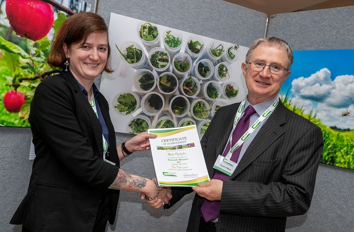 Dr Marta Niedzick pictured receiving an award from Professor Frank O Mara Director of Teagasc