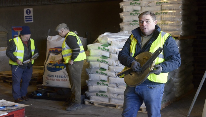Francis Quigley examining vanes on a fertiliser spreader