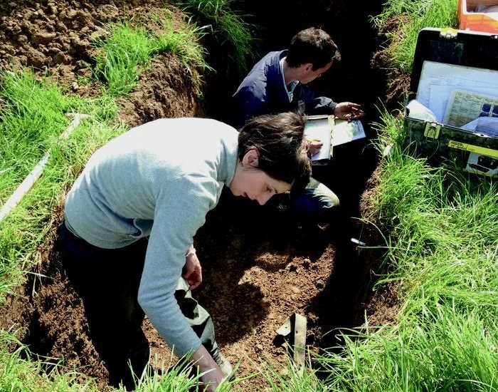 Giulia Bondi taking soil samples for measuring of carbon sequestration