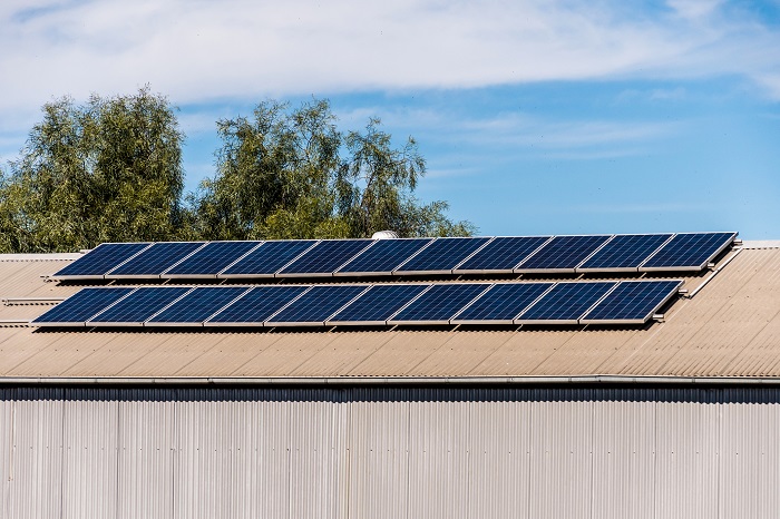 solar panels on a roof of a shed iStock
