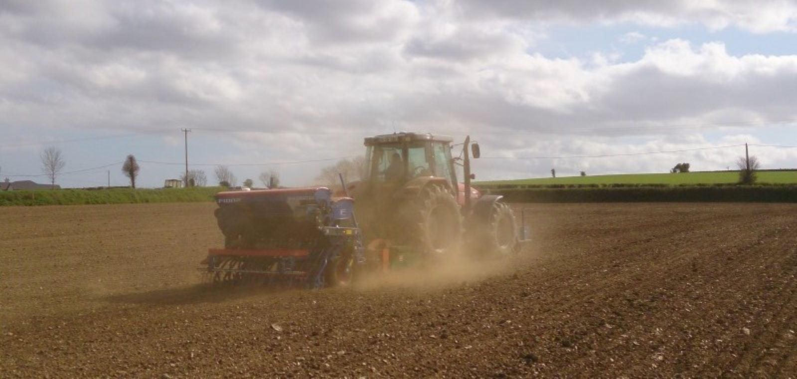 tractor sowing in a field