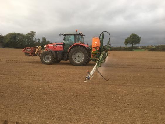spraying pre emergence herbicide