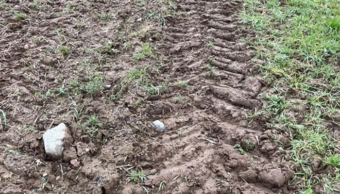 A tractor track after doing compaction damage in a tillage field