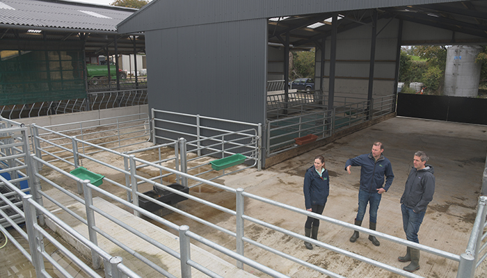 Aine Gaffney, David Argue and Conor Murphy are pictured at the handling unit on the farm