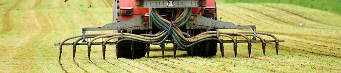 Slurry being spread via LESS on a cut silage sward