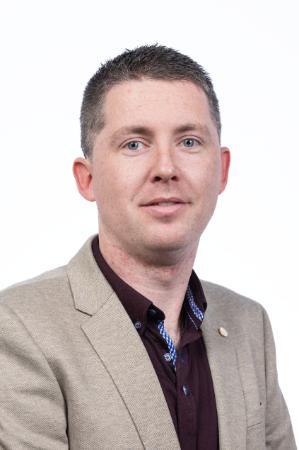 Head shot of Adrian Gaynard