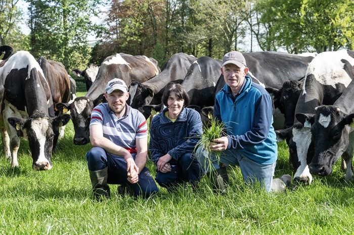 Pictured from left to right are Brendan, Maria and John Walsh in front of their herd of cows