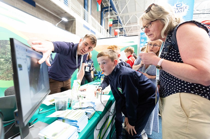 Gerry Nolan interacting with student and teacher at ESB Science Blast