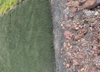 Recycled Astro turf on farm roadways