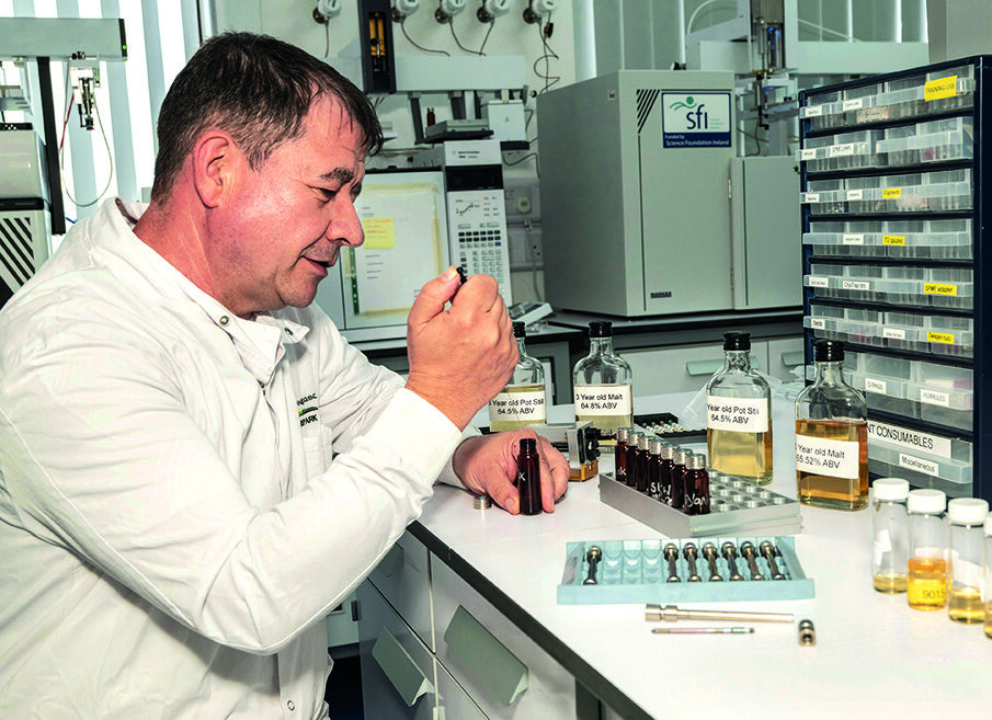 A scientist prepares samples in a laboratory