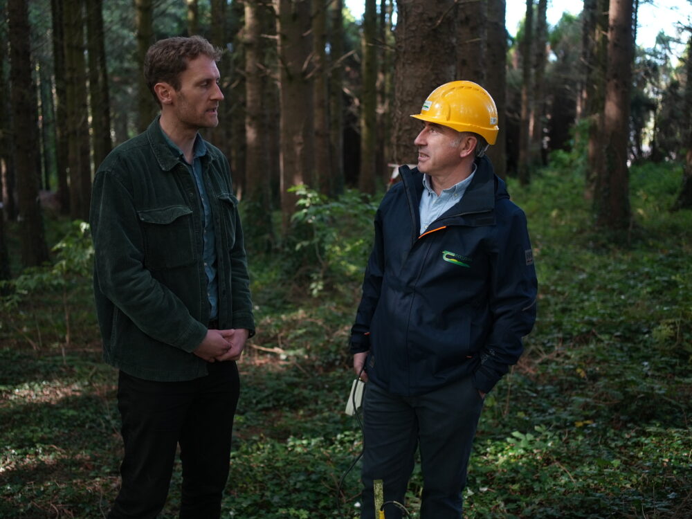 Presenter Fergus McAuliffe and Dr Niall Farrelly, Senior Forestry Research Officer, Teagasc, pictured in a forest