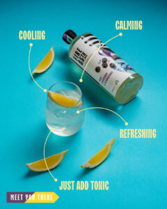 A bottle laying down, flavoured; Mint, Cardamom & Blackberry