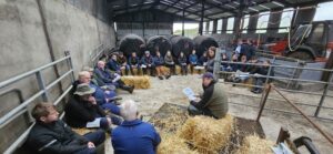Liz Duffy speaking to farmers at a farm walk.
