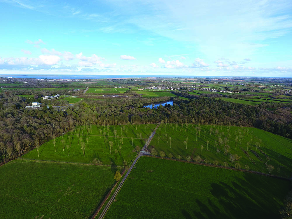 Aerial view of Irish landscape showing land, sea, forestry, agriculture and urban environments