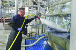 Farmer spraying rotary.