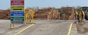 timber yard with safety signs